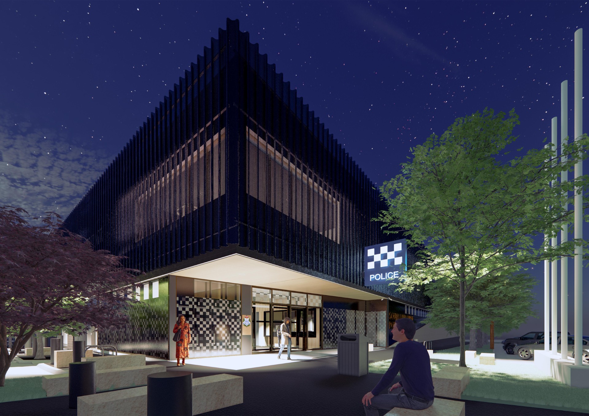 Artist's impression of the approved South Melbourne Police Station development at night, showing a modern building with lights illuminating the street from the ground floor, and pedestrians walking outside.